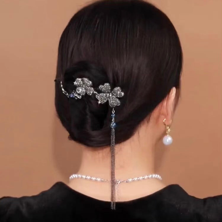 Rotating black flower hairpin