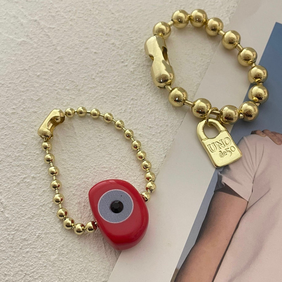 Designed Eye Shale Gold Beaded Bracelet