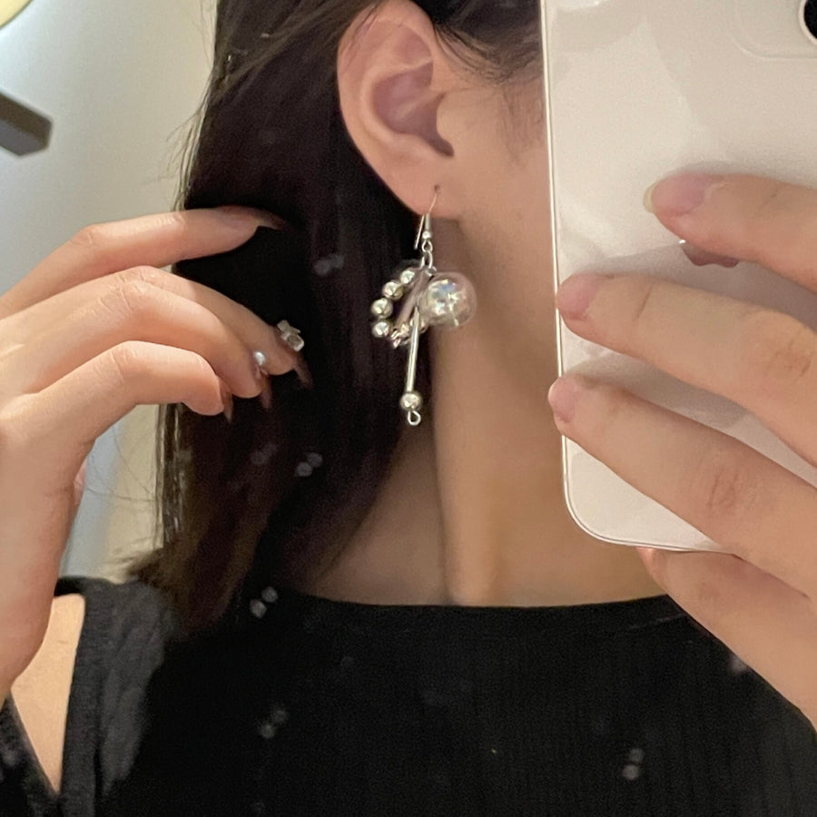 Exaggerated earrings