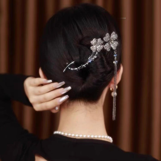 Rotating black flower hairpin